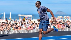 Usain Bolt musste sich nach seinem Sieg über 200 Meter um seinen Fan Barack Obama kümmern