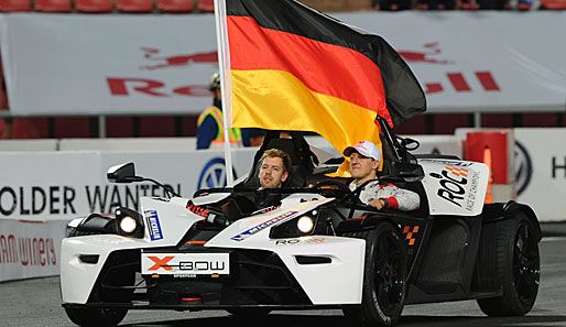 Sebastian Vettel und Michael Schumacher (r.) siegten erneut beim Race of Champions