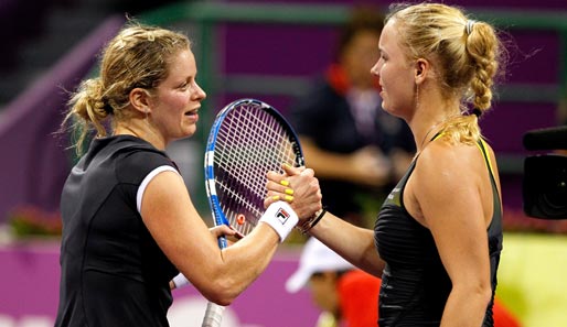 Der faire Handschlag: Siegerin Kim Clijsters (l.) gewann bereits drei Grand-Slam-Titel