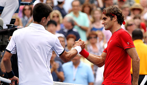 Roger Federer (r.) und Novak Djokovic (l.) verstehen sich gut