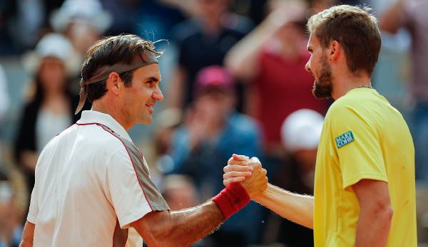 Oscar Otte (right) and Roger Federer after their duel at the French Open 2019.