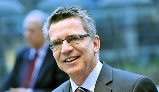 Bundesinnenminister Thomas de Maiziere will die Spiele 2018 in München sehen