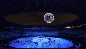 Mit leuchtenden Drohnen am Nachthimmel von Tokio bastelte man das offizielle Logo der Spiele in Tokio nach. Die gigantische Drohnen-Schar verformte sich danach ...