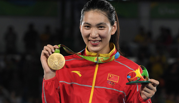 Zheng Shuyin gewann die Goldmedaille in der Klasse bis 67 Kilogramm