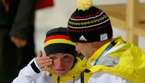 Für die deutschen Biathleten um Andrea Henkel (l.) liefen die Olympischen Spiele enttäuschend
