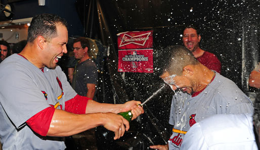 Carlos Beltran und Jon Jay von den Cardinals feiern den Playoff-Einzug des Champions wie den Titel
