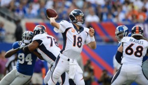 Peyton Manning (M.) entschied das Bruder-Duell gegen Eli deutlich für sich