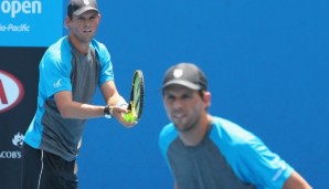 MELBOURNE, AUSTRALIA - JANUARY 21: Mike Bryan of the United States and Bob Bryan of the United States in action in their first round doubles match against John Millman of Australia and Benjamin Mitchell of Australia during day three of the 2015 Aust...