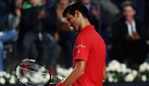 ROME, ITALY - MAY 14: Novak Djokovic of Serbia looks on, after breaking a string on his racquet during his match against Kei Nishikori of Japan during day seven of The Internazionali BNL d'Italia 2016 on May 14, 2016 in Rome, Italy. (Photo by Matth...