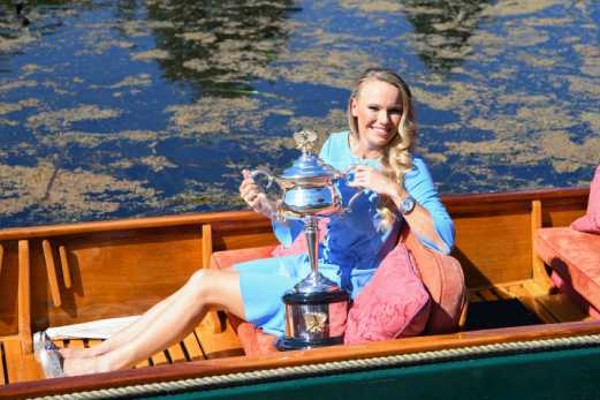 Caroline Wozniacki badete nach dem Gewinn ihres ersten Major-Titels im Glück